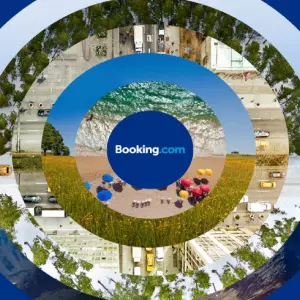 Comparative analysis of market dominance between Booking Holdings and Expedia in 2023.